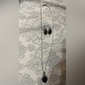 Black onyx necklace and earrings. Sterling silver…not sure If onyx is real